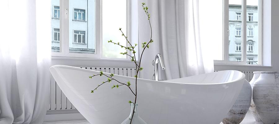 Rolltop bath with modern bathroom window