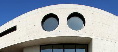 Large porthole windows as imposing facade feature